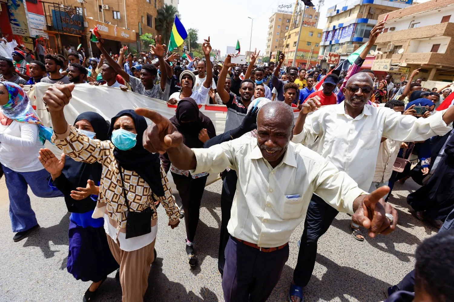 Protesters march during a rally against military rule, following the last coup and to commemorate the 3rd anniversary of demonstrations in Khartoum, Sudan June 30, 2022. (Reuters)
