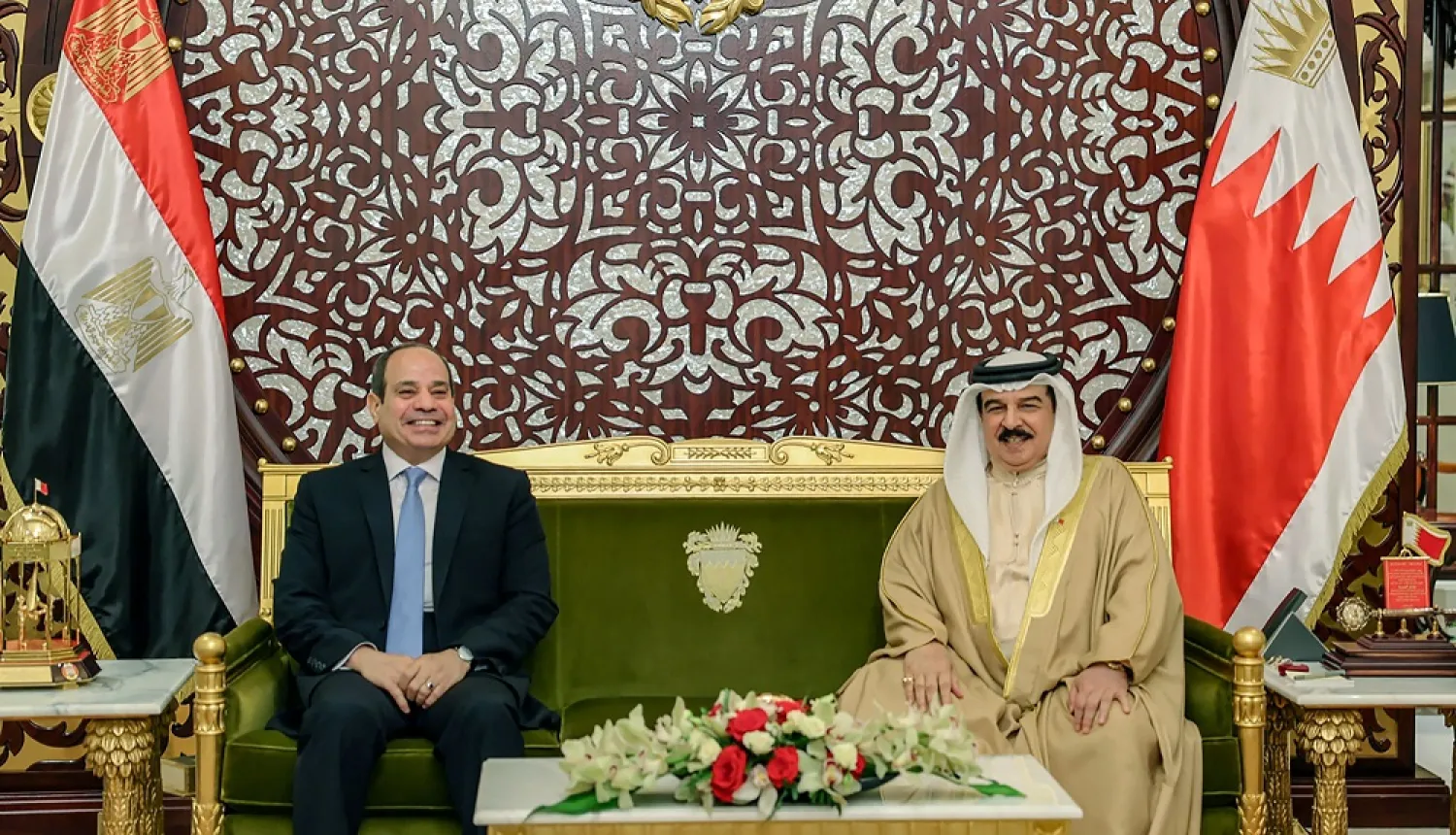  A handout picture released by Bahrain's official news agency (BNA) shows Bahrain's King Hamad bin Isa al-Khalifa (R) receiving Egypt's President Abdel Fattah al-Sisi in the capital Manama, on June 28, 2022. (BNA)