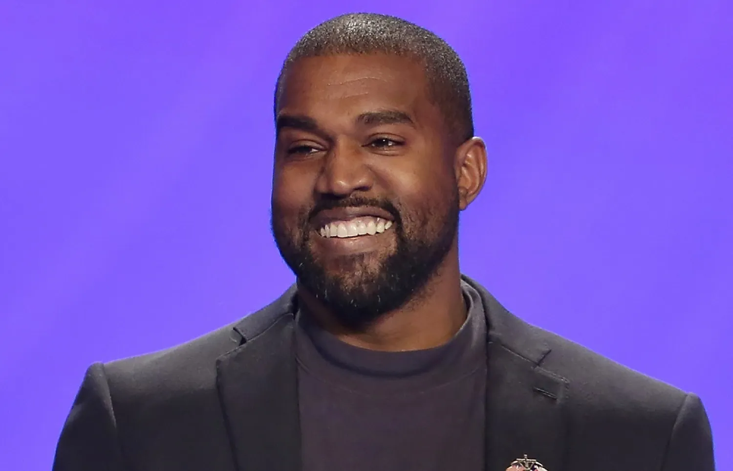 In this Nov. 17, 2019, file photo, Kanye West appears on stage during a service at Lakewood Church in Houston. West turns 45 on June 8. (AP) 