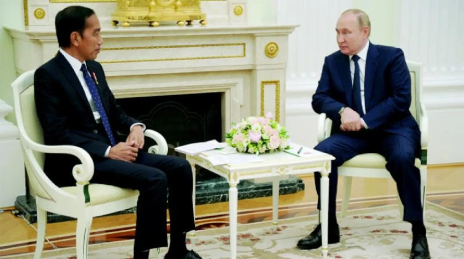 Putin dün Endonezyalı mevkidaşı Joko Widodo ile Moskova'da bir araya geldi. (Reuters) 