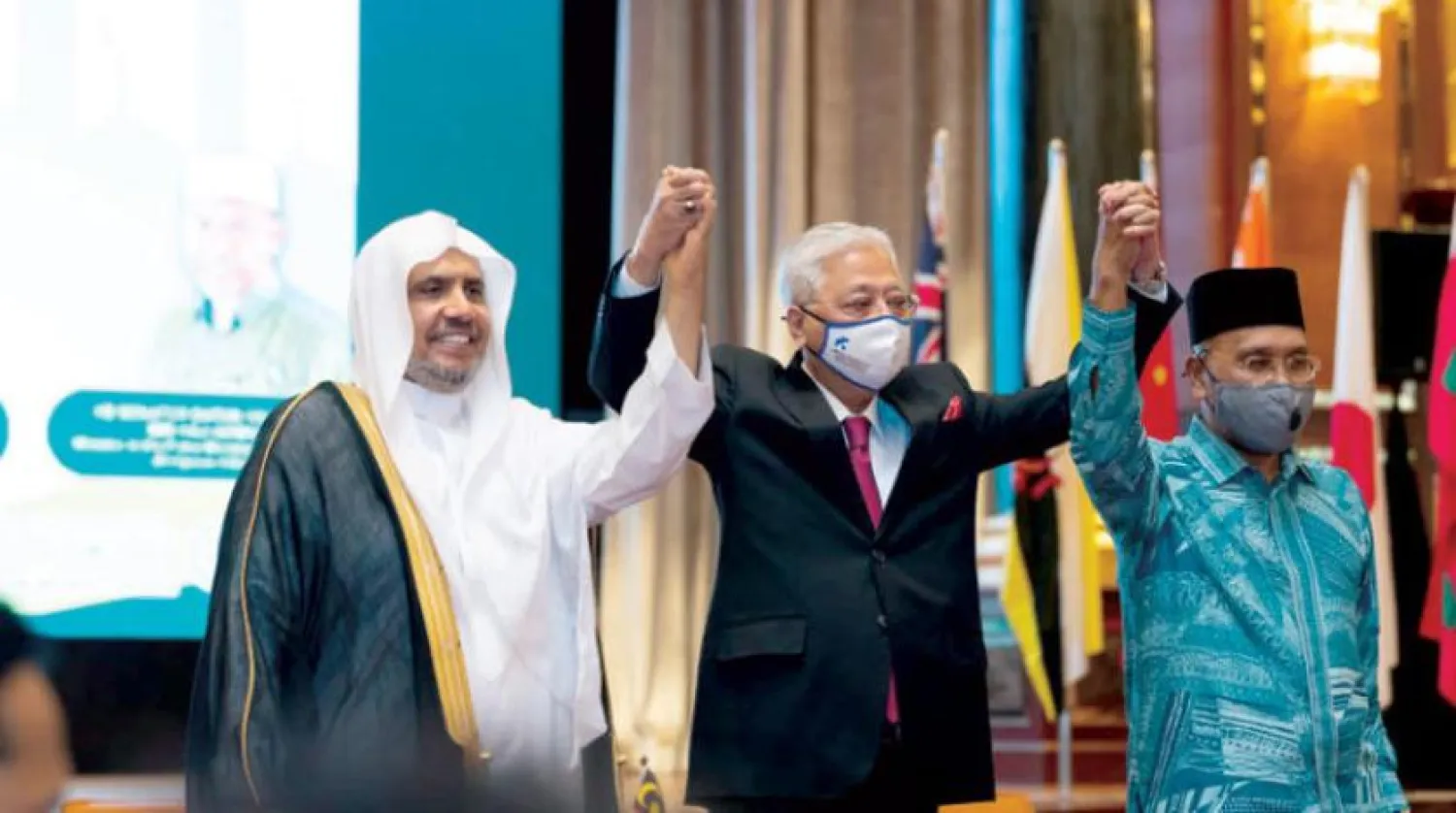 Malaysian Prime Minister Ismail Sabri Yaakob, Malaysian Religious Affairs Minister Idris Ahmad and MWL Secretary-General Sheikh Dr. Mohammad bin Abdulkarim Al-Issa (Asharq Al-Awsat)