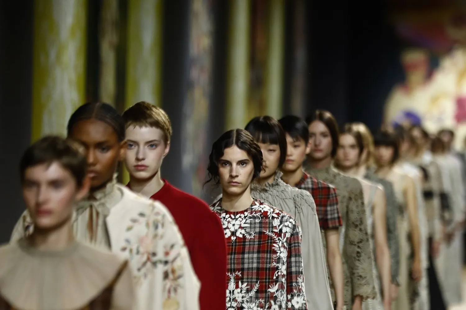 Models present creations from the Fall/Winter 2022/23 Haute Couture collection for fashion house Dior by designer Maria Grazia Chiuri during the Paris Fashion Week, in Paris, France, 04 July 2022. (EPA)