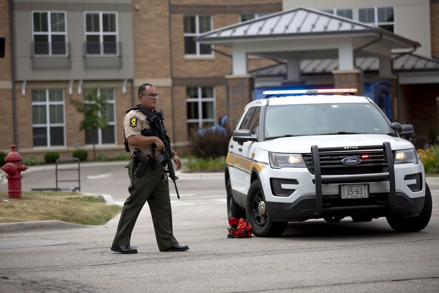 First responders work the scene of a shooting at a Fourth of July parade on July 4, 2022 in Highland Park, Illinois. (Getty Images/AFP)
