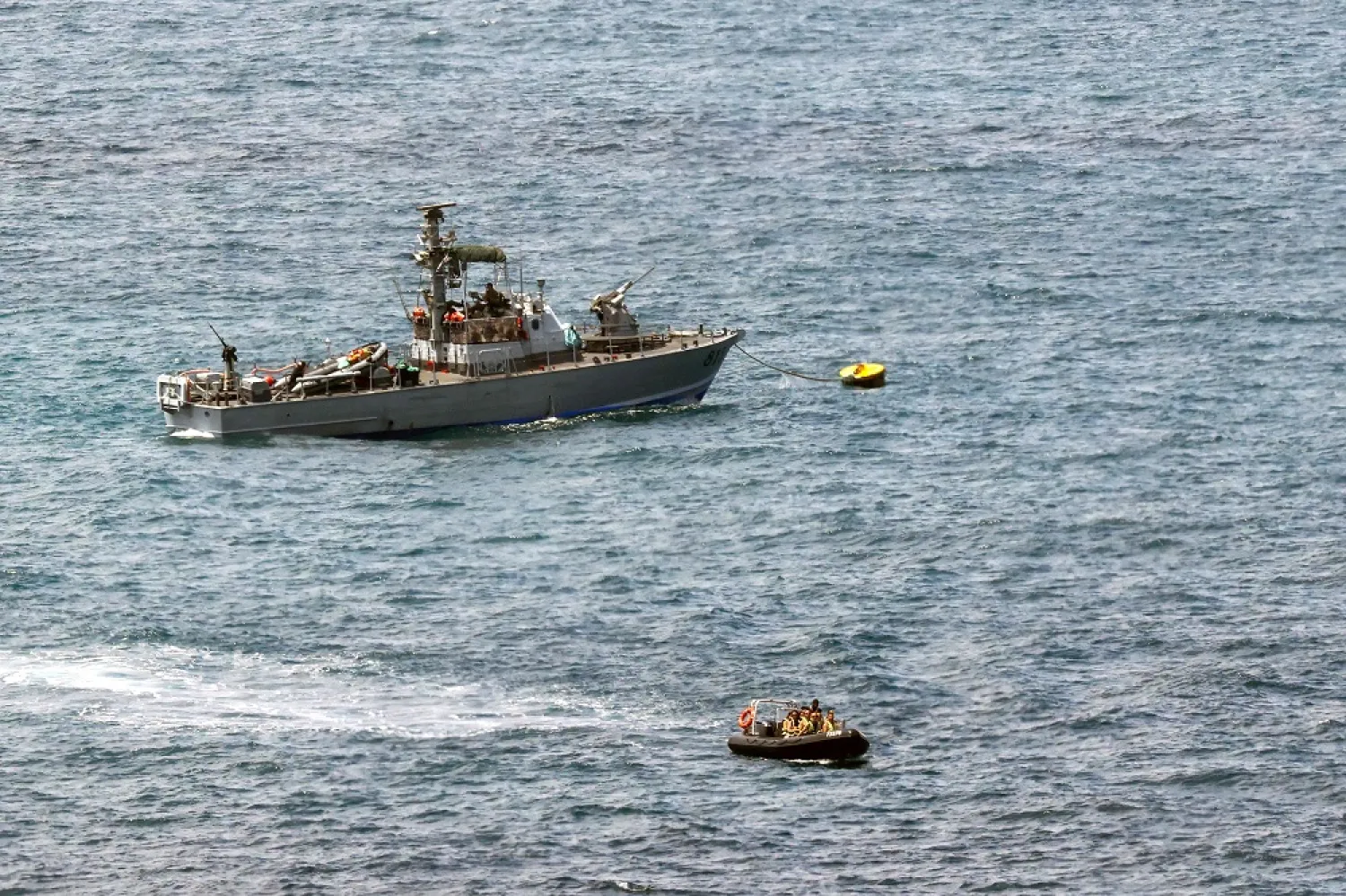 An Israeli navy vessel is pictured off the coast of Rosh Hanikra, an area at the border between Israel and Lebanon (Ras al-Naqura), on July 3, 2022. (AFP)