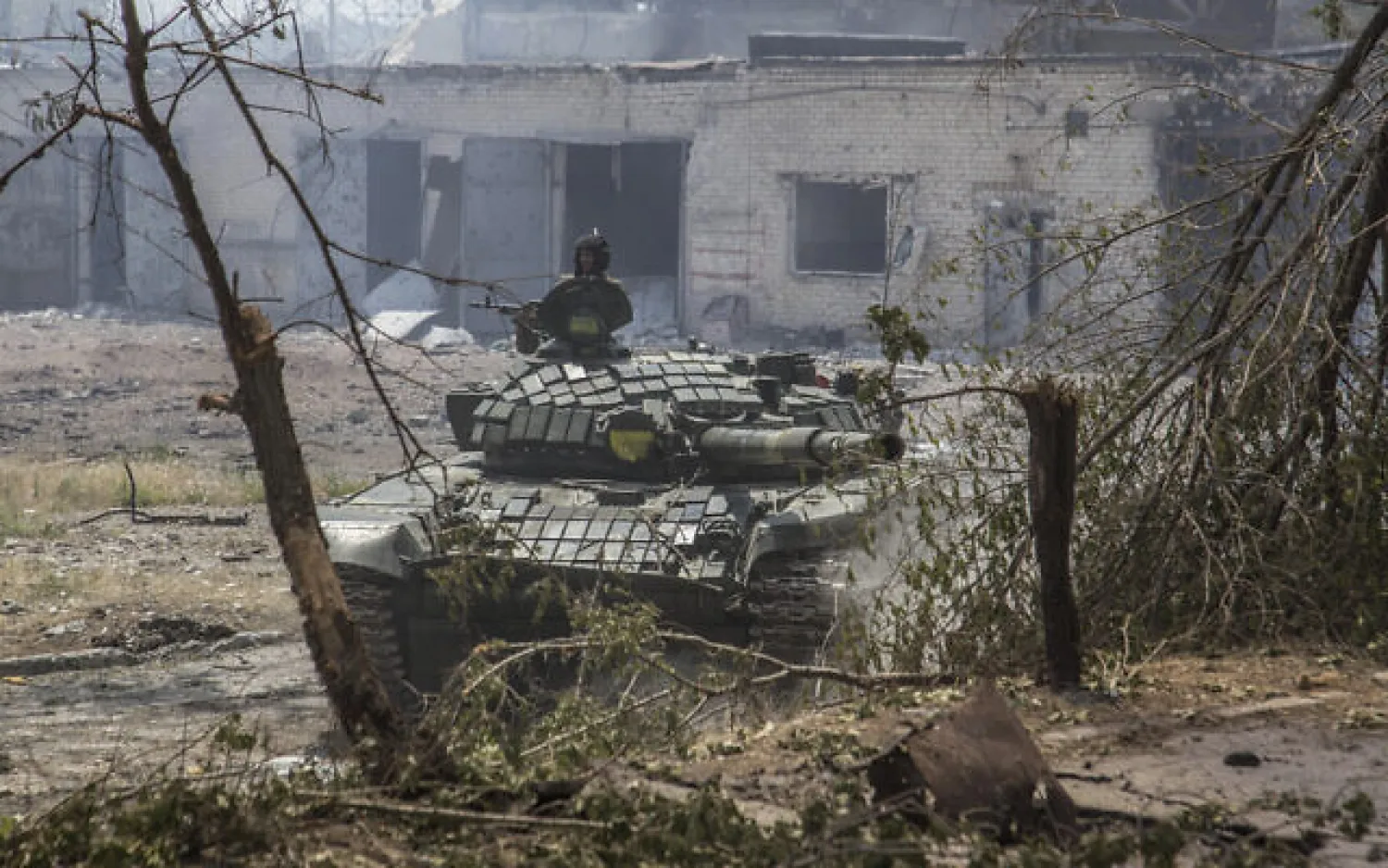 A Ukrainian tank is in position during heavy fighting on the front line in Severodonetsk, the Luhansk region, Ukraine, June 8, 2022. (AP Photo/Oleksandr Ratushniak)
