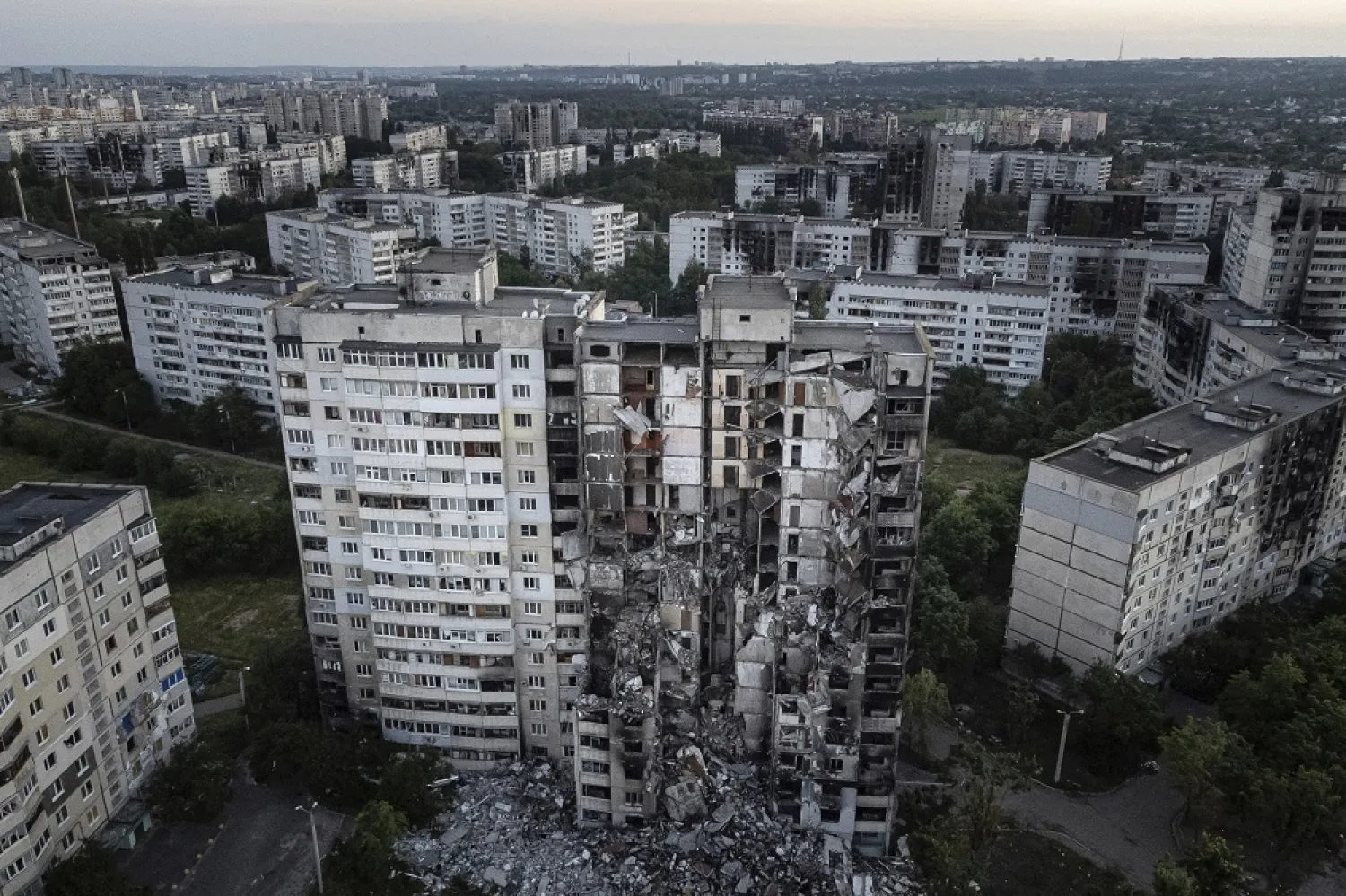 An apartment building damaged by Russian attack is seen in Kharkiv, Ukraine, on Monday, July 4, 2022. (AP)