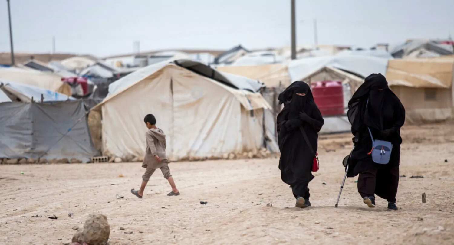 File photo taken May 1, 2021 of women and children in the al-Hol camp in Hasakeh province, Syria. © Baderkhan Ahmad, AP
