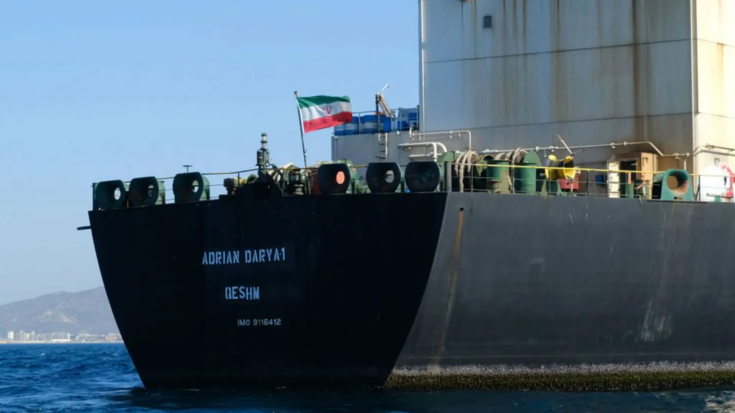  In this photo taken on August 18, 2019, an Iranian flag flutters on board an oil tanker that entered Syria’s Baniyas Port. (AFP File Photo) 
