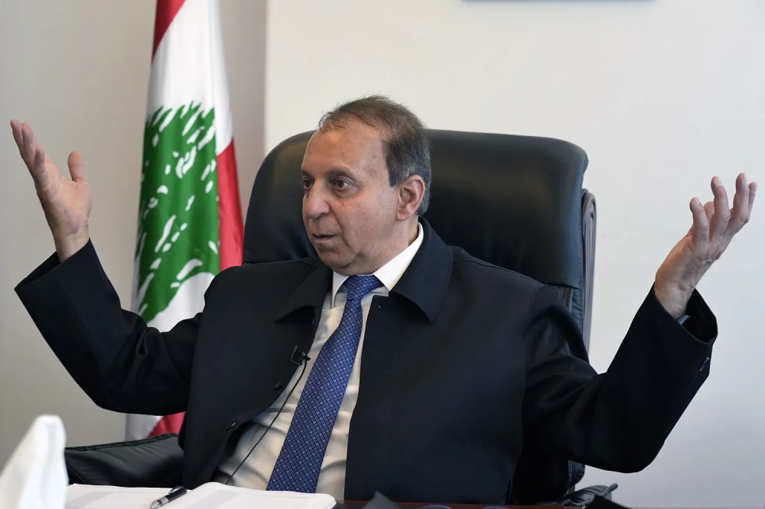 Issam Sharafeddine, Lebanon's caretaker Minister of the Displaced, speaks during an interview with The Associated Press, in his office at the ministry, in Beirut, Lebanon, Wednesday, July 6, 2022. (AP)