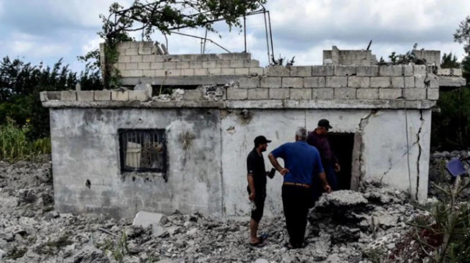 A photo published by Syria’s official news agency SANA on July 2 shows the damage caused to a building as a result of an Israeli raid on Tartus, in western Syria. (AFP) 