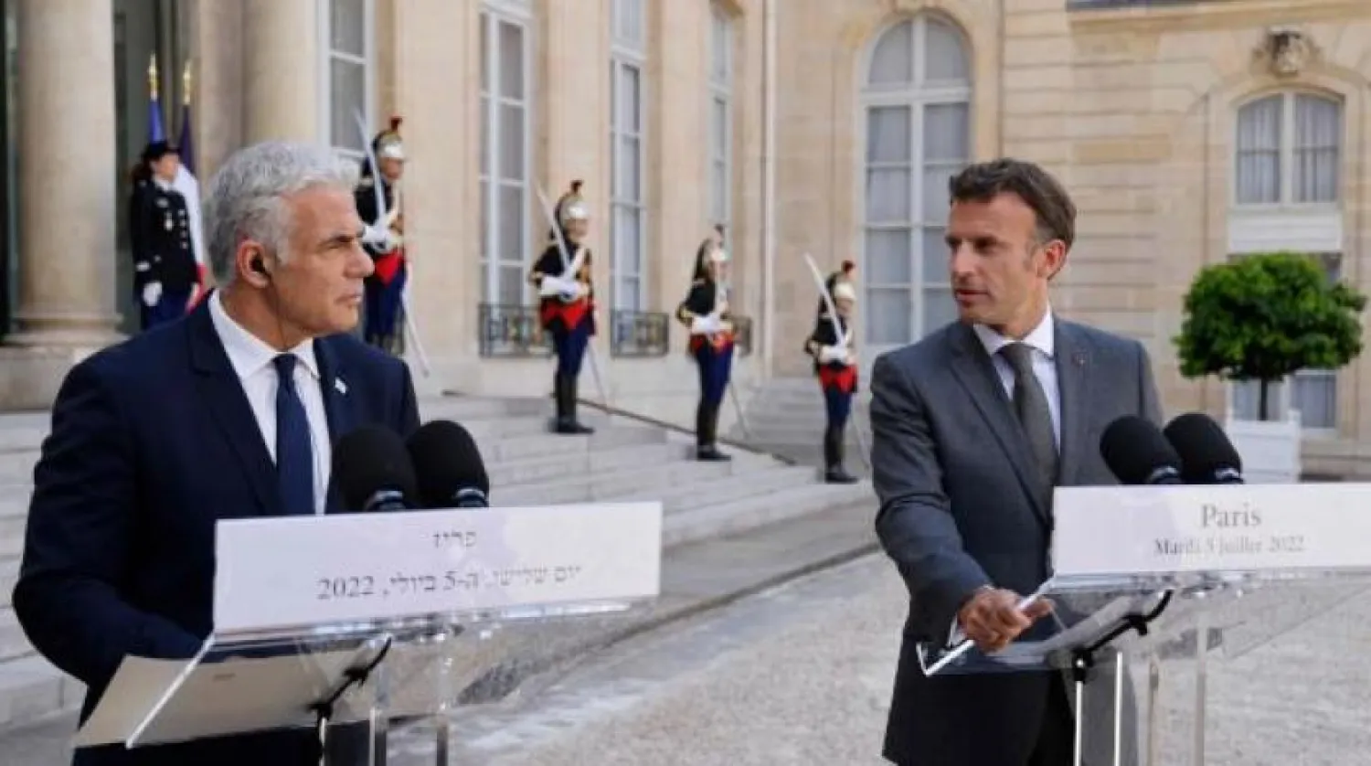 President Emmanuel Macron and Israeli Prime Minister Yair Lapid at a press conference in Paris (AFP)
