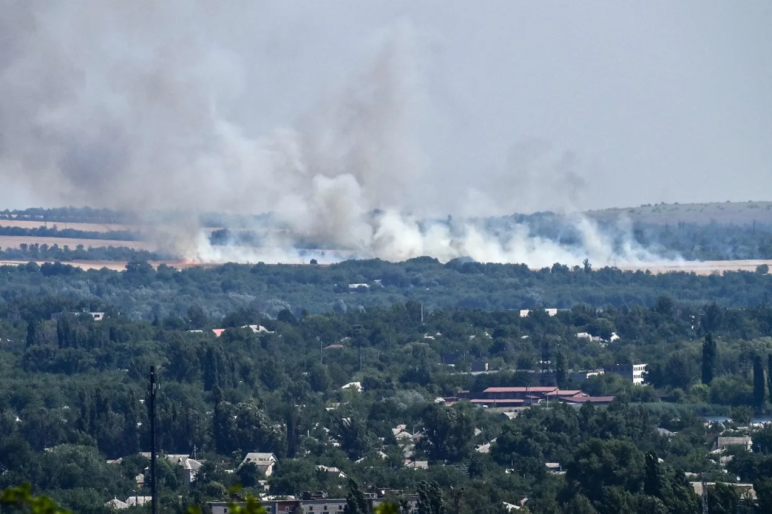 This photograph taken on July 7, 2022 shows smoke billowing after shelling on the outskirts of the city of Sloviansk, amid the Russian invasion in Ukraine. (AFP) 