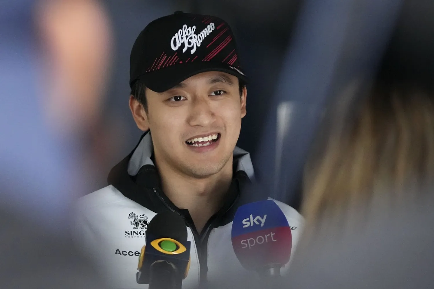 Alfa Romeo driver Zhou Guanyu of China answers to questions of journalists during interviews ahead of the Austrian Formula One Grand Prix at the Red Bull Ring racetrack in Spielberg, Thursday, July 7, 2022. (AP)