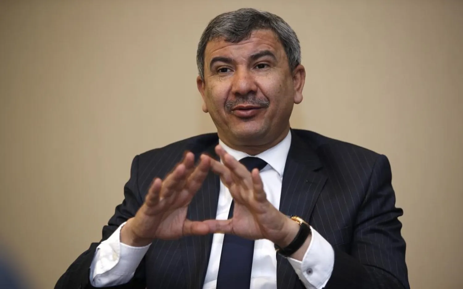 Ihsan Abdul-Jabbar Ismail, Iraq Oil minister speaks during an interview with The Associated Press in Baghdad, Iraq, Friday, June 11, 2021.(AP)