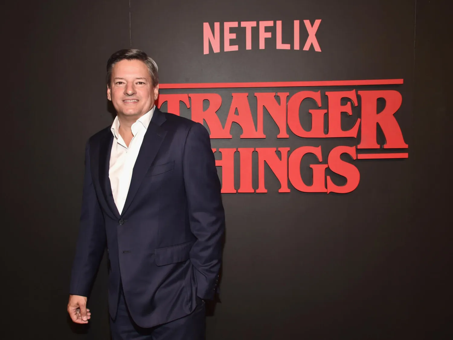 Netflix's Ted Sarandos, seen here at the "Stranger Things" premiere in July 2016, said the show's creators Matt and Ross Duffer "are an exceptionally unique talent with a vision so crisp and clear" Alberto E. Rodriguez GETTY IMAGES NORTH AMERICA/AFP/File
