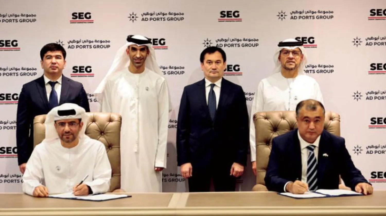 Officials at the signing ceremony between AD Ports and SEG. (WAM)