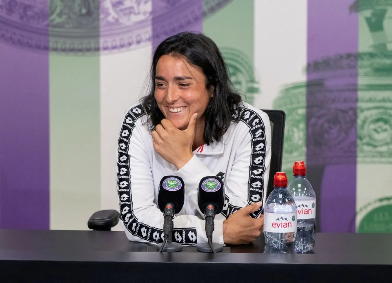 Tennis - Wimbledon - All England Lawn Tennis and Croquet Club, London, Britain - July 7, 2022 Tunisia's Ons Jabeur during a press conference after winning her semi final match against Germany's Tatjana Maria Joe Toth/Pool via REUTERS