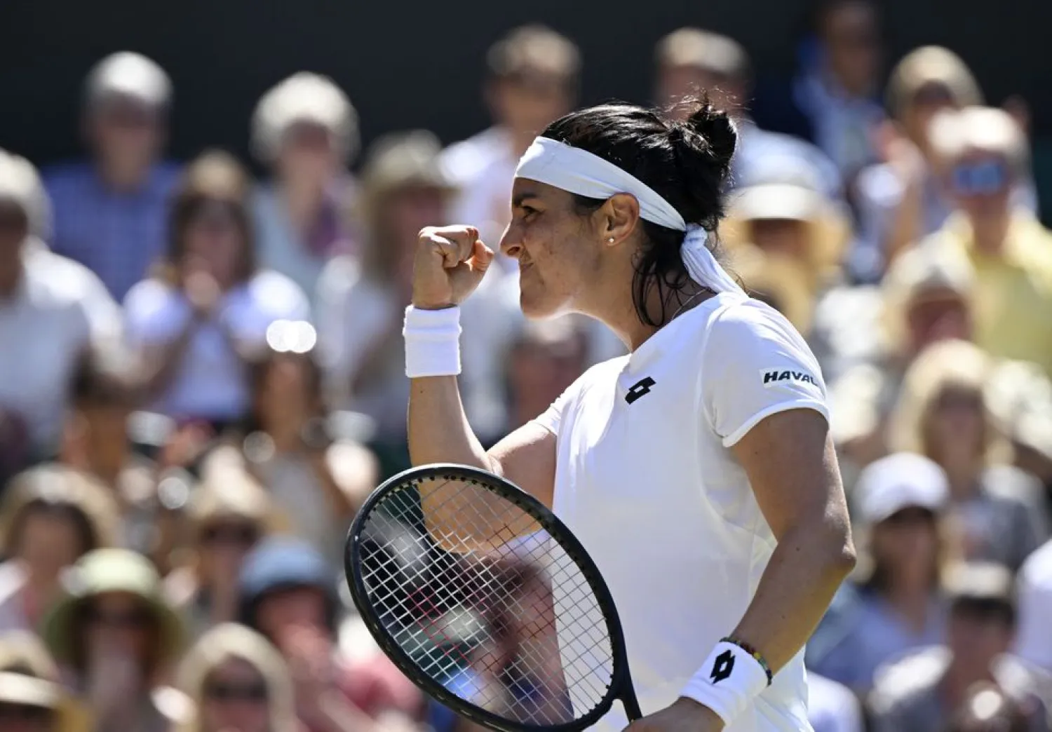 Tennis - Wimbledon - All England Lawn Tennis and Croquet Club, London, Britain - July 7, 2022 Tunisia's Ons Jabeur reacts during her semi final match against Germany's Tatjana Maria REUTERS/Toby Melville




