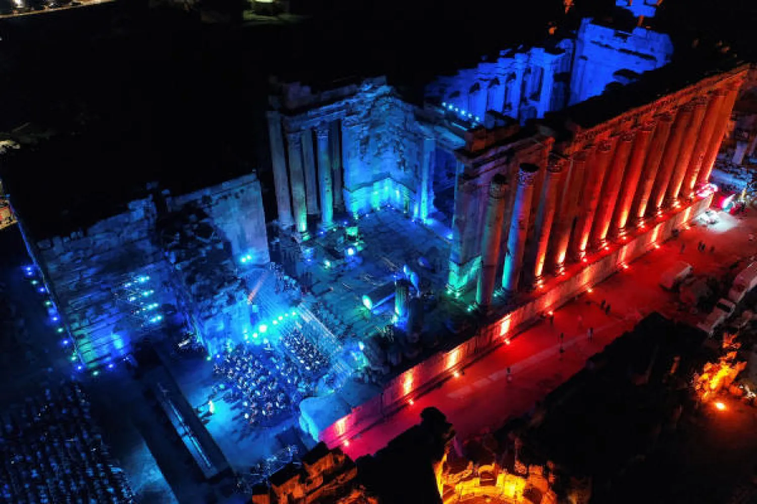 Lebanese singer Soumaya Baalbaki and conductor Lubnan Baalbaki perform at the Roman temple of Bacchus, during the opening of Baalbeck International Festival, in Baalbeck, Lebanon July 8, 2022. REUTERS/Issam Abdallah
