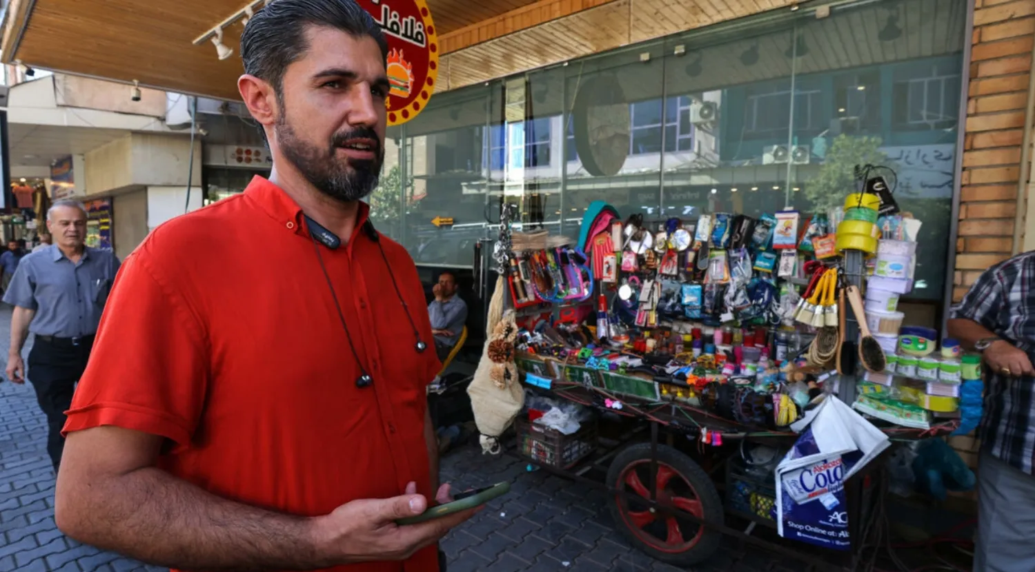 Iraqi Kurd Haresh Talib says he struggles to get paid and his children's schooling is disrupted in his conflict-riddled country AHMAD AL-RUBAYE AFP
