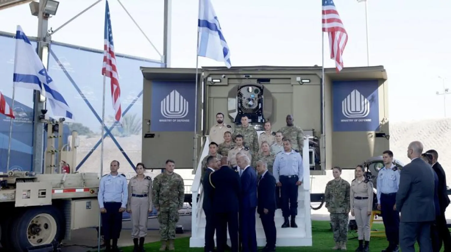 Caption: Israeli Prime Minister Yair Lapid and US President Joe Biden attend a briefing on the Israel's Iron Dome and Iron Beam Air Defense Systems at the Ben Gurion International Airport in Lod, near Tel Aviv, Israel, July 13, 2022. (Reuters)

