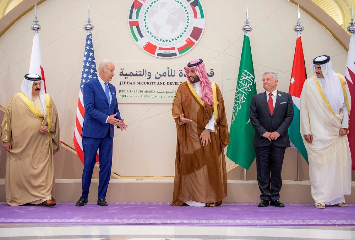 Saudi Crown Prince Mohammed bin Salman and US President Joe Biden gesture as they stand for a family photo ahead of the Jeddah Security and Development Summit in Jeddah, Saudi Arabia, July 16, 2022. (Saudi Royal Court/Handout via Reuters)