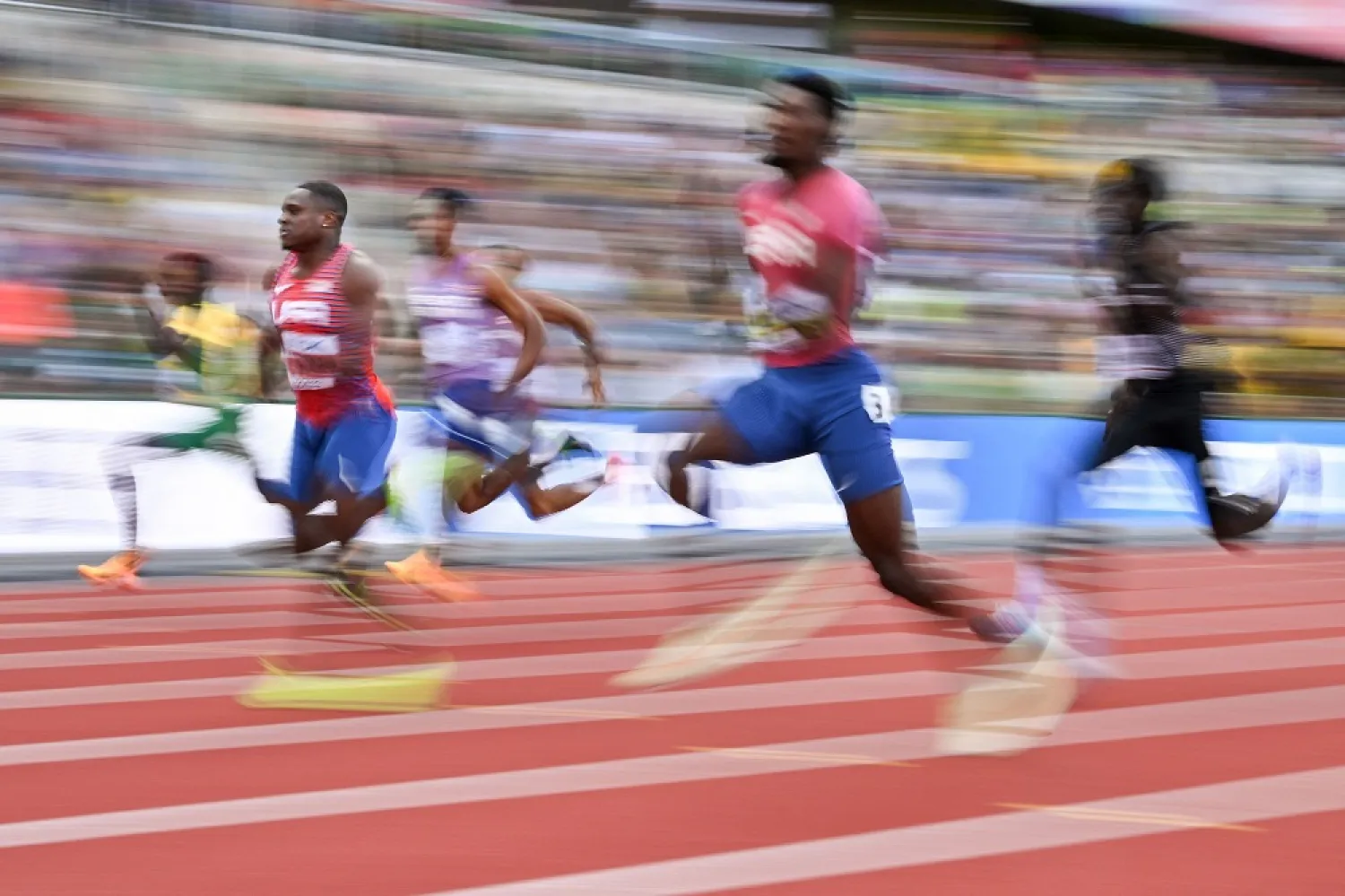 USA's Christian Coleman (2nd L), and USA's Fred Kerley (2nd R) compete in the men's 100m semi-final during the World Athletics Championships at Hayward Field in Eugene, Oregon on July 16, 2022. (AFP)