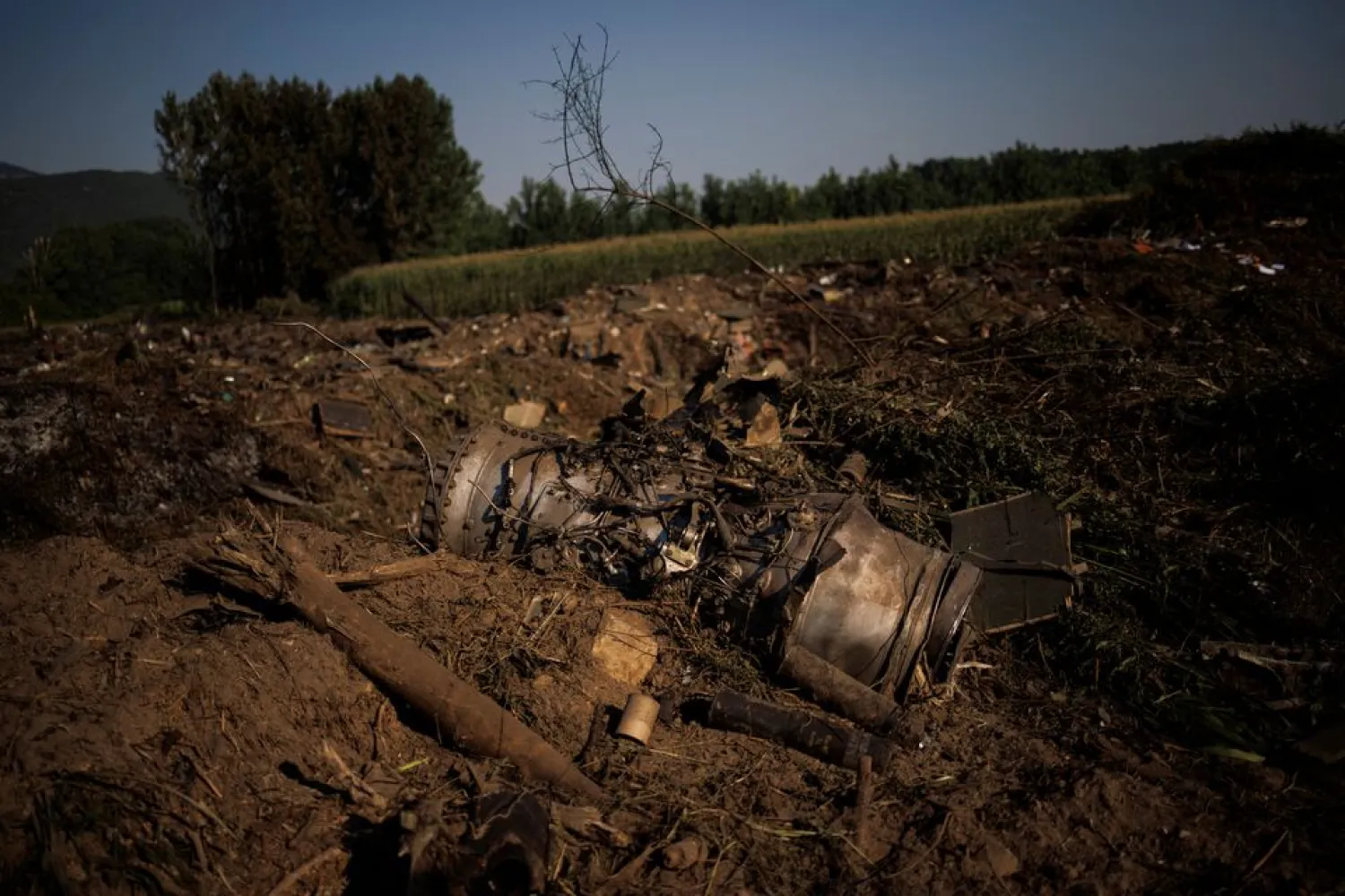 Debris is seen at the crash site of an Antonov An-12 cargo plane owned by a Ukrainian company, near Kavala, Greece, July 17, 2022. REUTERS/Alkis Konstantinidis
