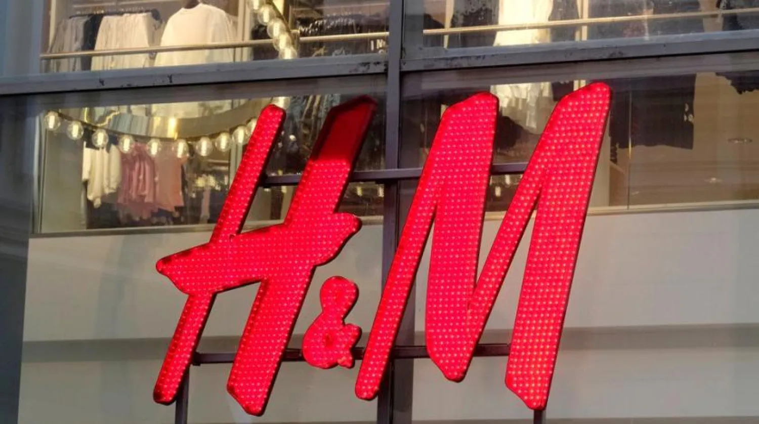 H&M logo is seen on one of the Swedish retailer's shops January 30, 2020. (Reuters)
