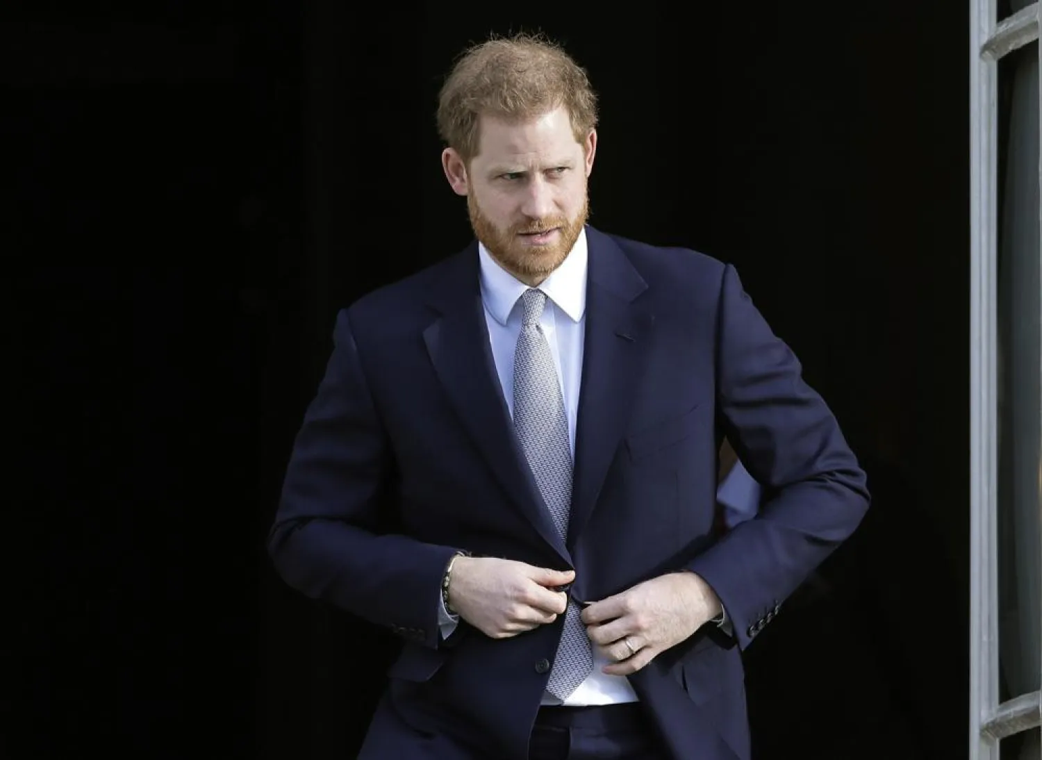 FILE Britain's Prince Harry arrives at the gardens at Buckingham Palace in London, Thursday, Jan. 16, 2020. (AP Photo/Kirsty Wigglesworth, File)

