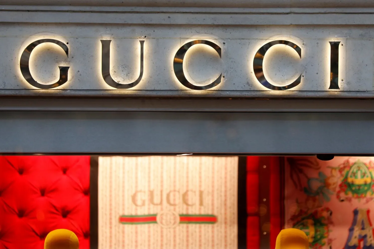 A Gucci sign is seen outside a shop in Paris, France, December 18, 2017. (Reuters)