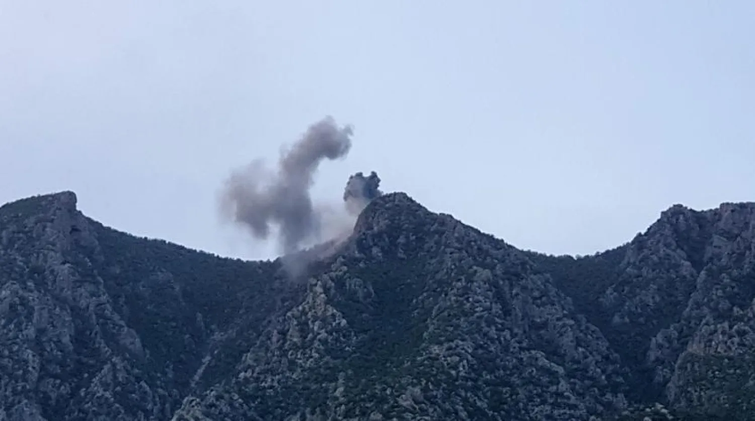 Smoke billows following reported Turkish warplane raids, from a site in the Matin Mountains near the village of Koherzi in the Amadiyah district, northeast of Dohuk in the Kurdish autonomous region of Iraq, on April 28th 2022. (AFP)
