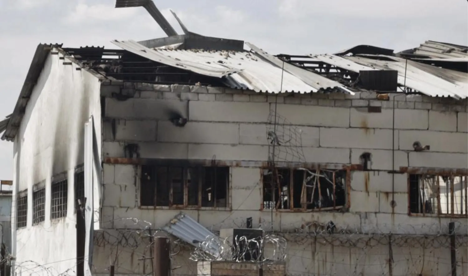 In this photo taken from video a view of a destroyed barrack at a prison in Olenivka, in an area controlled by Russian-backed separatist forces, eastern Ukraine, Friday, July 29, 2022.  (AP Photo)

