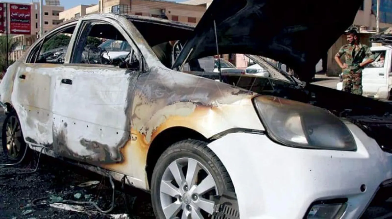 صورة تداولها ناشطون للسيارة التي انفجرت عند مدخل مدينة درعا السبت