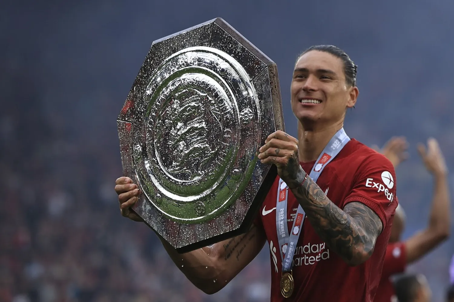 Liverpool's Darwin Nunez celebrates after winning the FA Community Shield soccer match against Manchester City at the King Power Stadium in Leicester, England, Saturday, July 30, 2022. (AP)