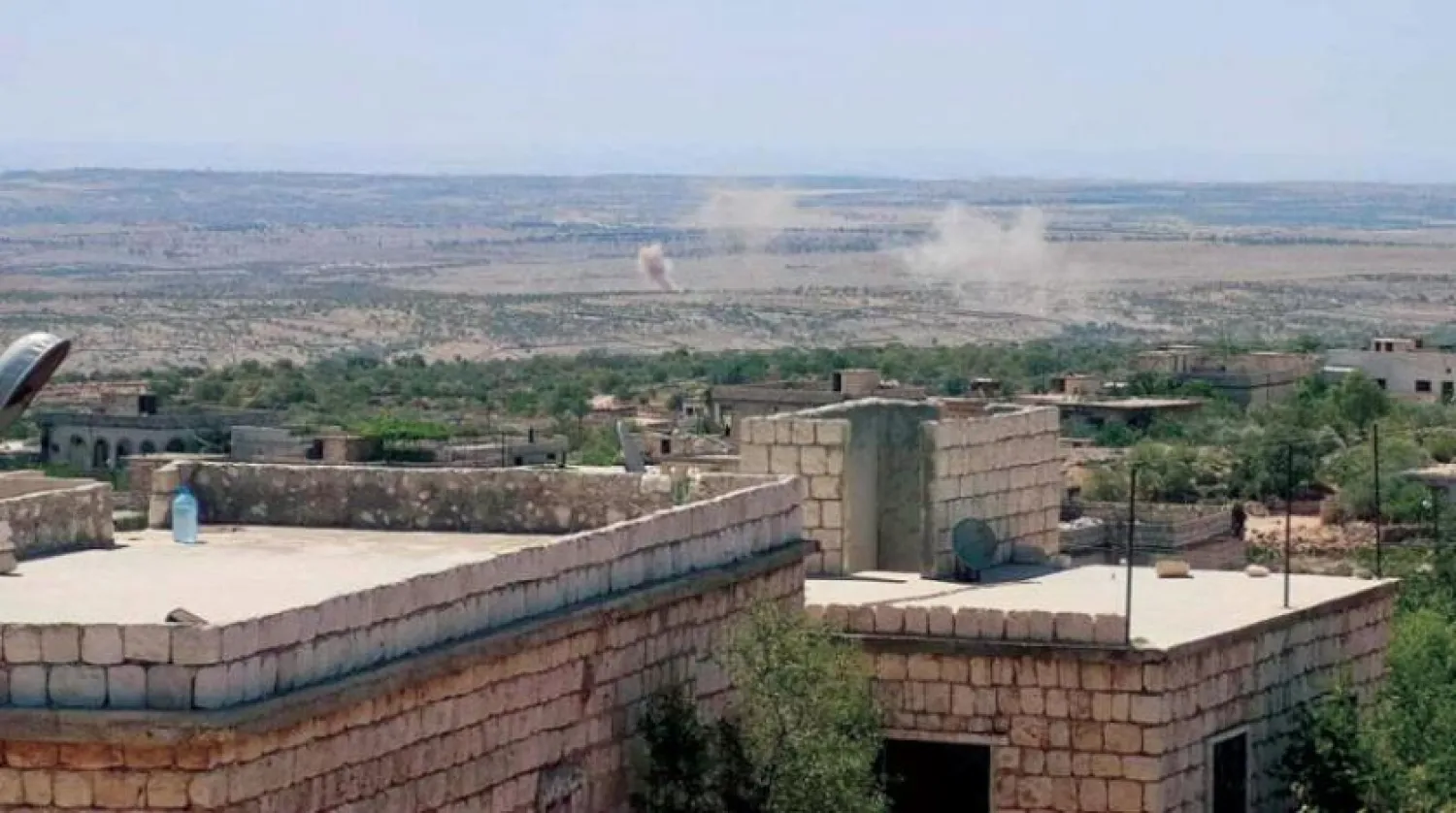 Regime forces carry out an attack on Jabal al-Zawiya in Idlib. (Asharq Al-Awsat)