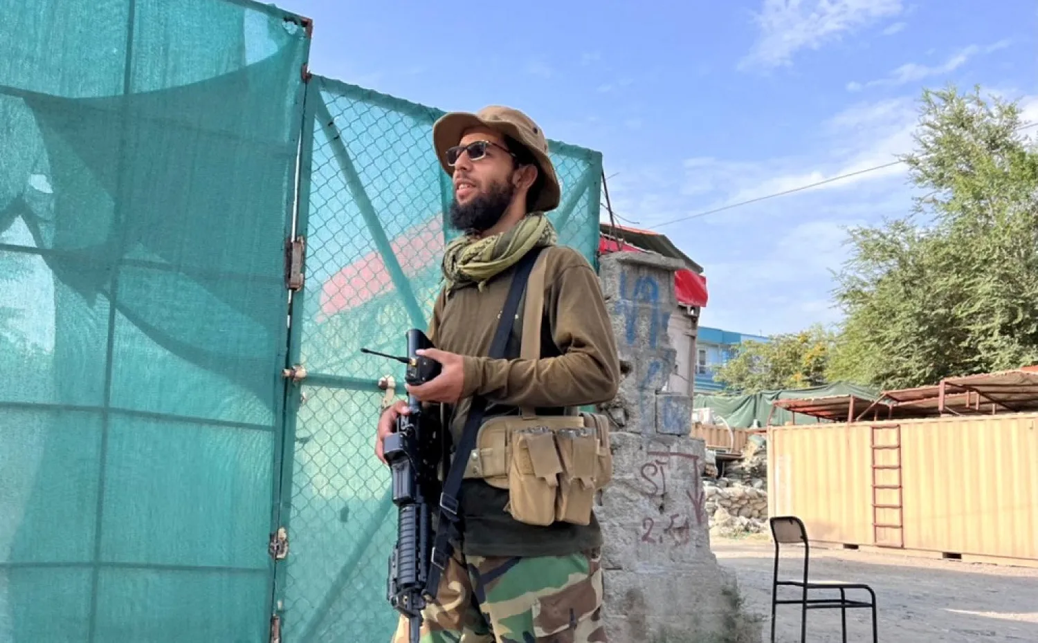 A Taliban fighter stands guard near the site where al-Qaeda leader Ayman al-Zawahiri was killed in a US strike over the weekend, in Kabul, Afghanistan, August 2, 2022. (Reuters)
