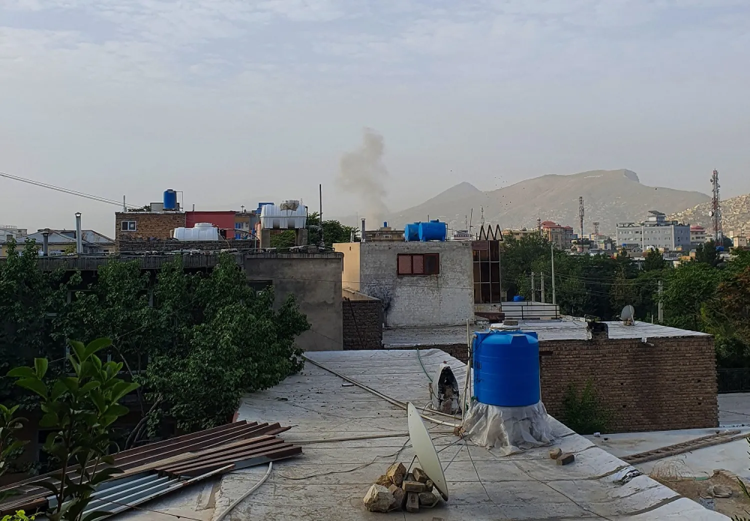 In this photograph taken on July 31, 2022, smoke rises from a house following a US drone strike in the Sherpur area of Kabul. (AFP)