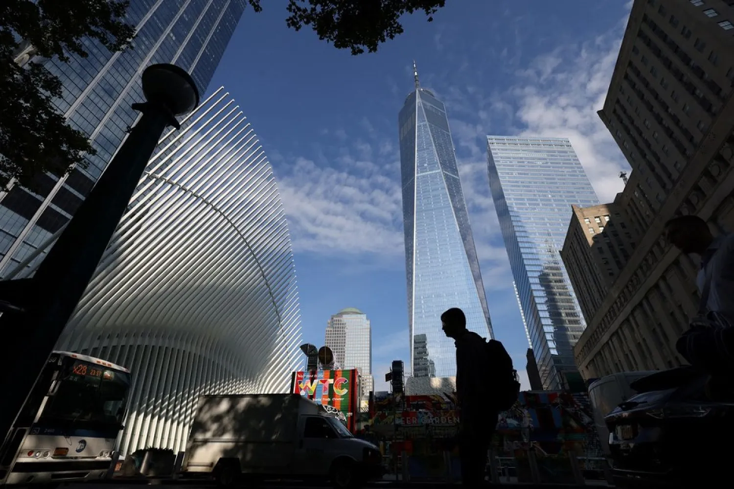 People walk by One World Trade Center after US President Joe Biden confirmed the death of al-Qaeda leader Ayman al-Zawahiri in Manhattan, New York City, US, August 2, 2022. (Reuters)