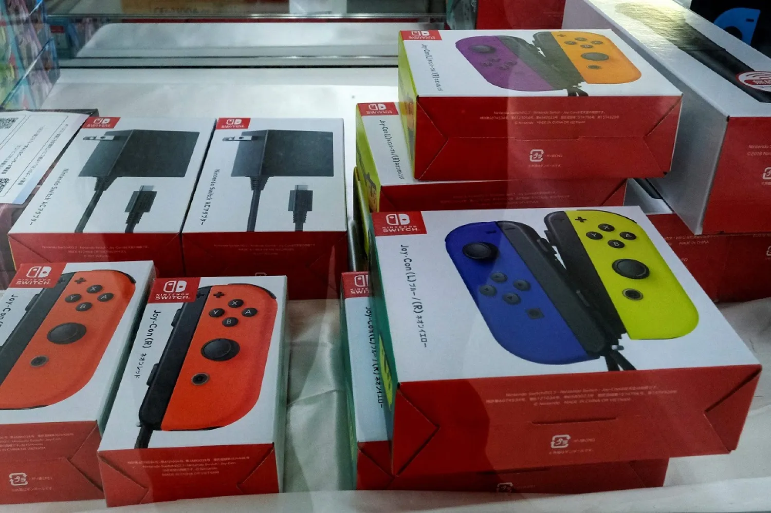 This picture taken on August 2, 2022 shows Nintendo Switch video game accessories on display in a showcase at a shop in Tokyo. (AFP)