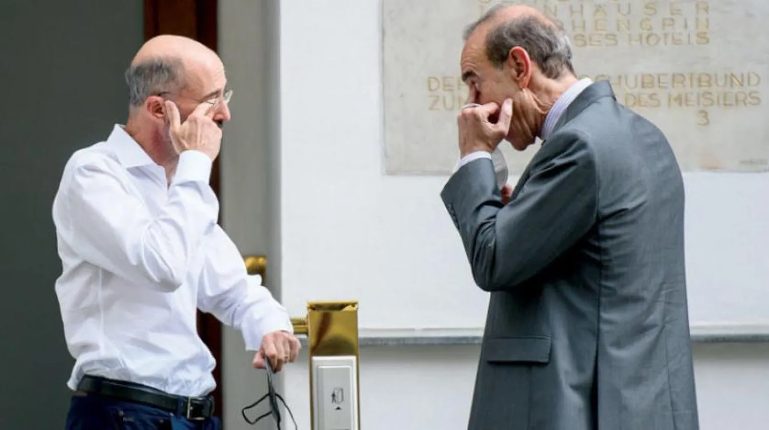 Enrique Mora and Robert Malley on the sidelines of the Iranian nuclear negotiations in Vienna, June 20, 2021 (EPA)
