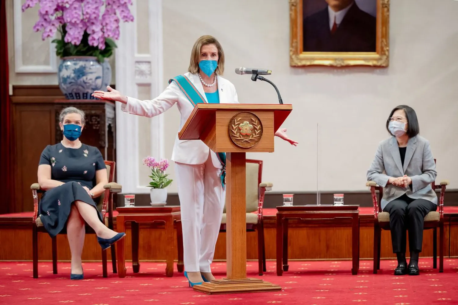 US House of Representatives Speaker Nancy Pelosi speaks next to Taiwan President Tsai Ing-wen and American Institute in Taiwan (AIT) Director Sandra Oudkirk during a meeting at the presidential office in Taipei, Taiwan August 3, 2022. Taiwan Presidential Office/Handout via REUTERS
