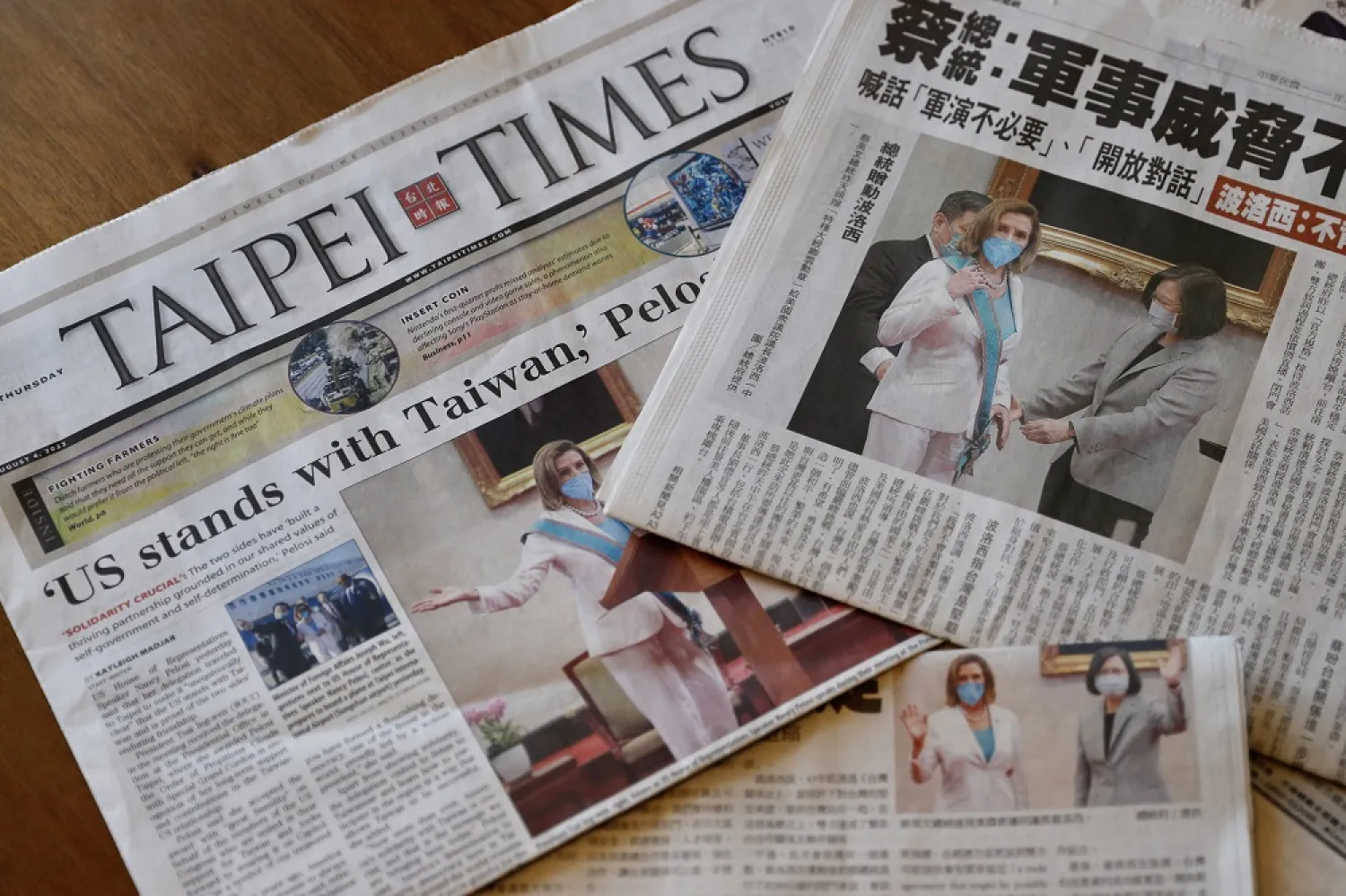 Taiwan newspapers with the front page photos of the meeting between US House Speaker Nancy Pelosi and Taiwan president Tsai Ing-wen are displayed, in Taipei, Taiwan, 04 August 2022. (EPA)