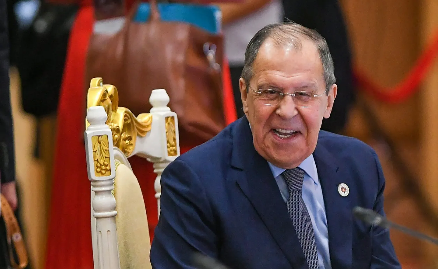 Russia's Foreign Minister Sergei Lavrov smiles at the East Asia Summit Foreign Ministers meeting during the 55th ASEAN Foreign Ministers' Meeting in Phnom Penh on August 5, 2022. (AFP)