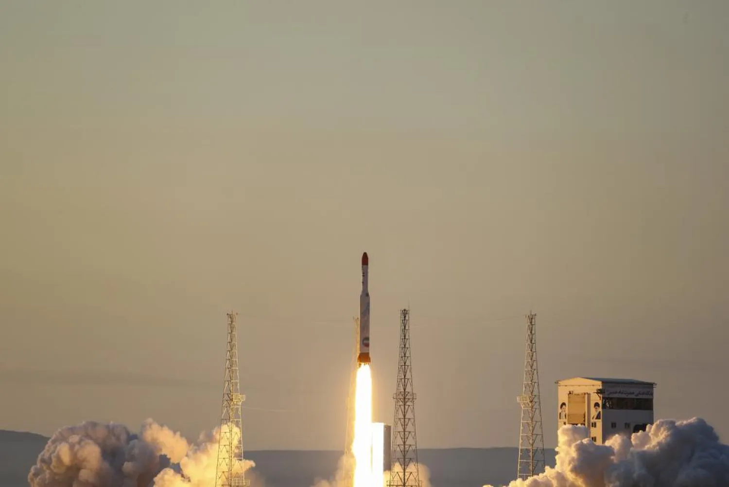 This photo released by the official website of the Iranian Defense Ministry on Thursday, Dec. 30, 2021, shows the launching of Simorgh, or "Phoenix," rocket in an undisclosed location in Iran. (Iranian Defense Ministry via AP)
