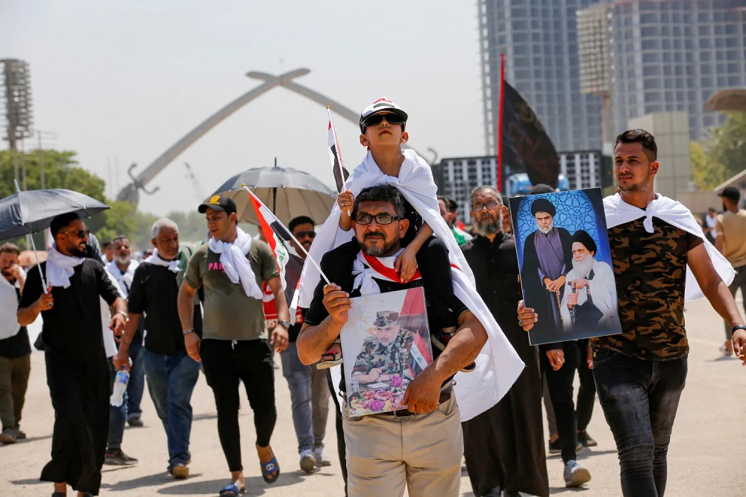 Supporters of Iraqi populist leader Moqtada al-Sadr gather for mass Friday prayer at Grand Festivities Square within the Green Zone, in Baghdad, Iraq August 5, 2022. (Reuters)