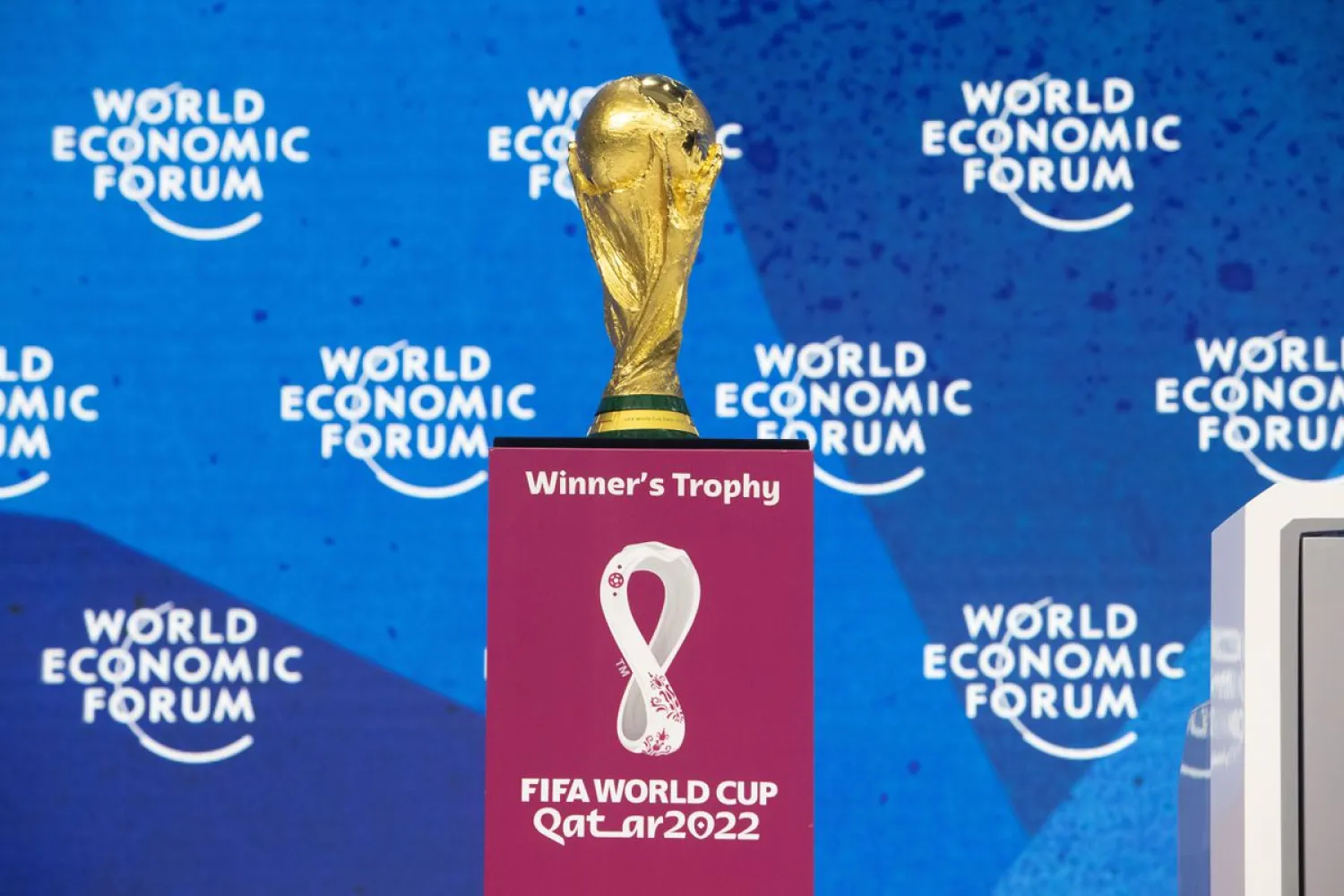 The FIFA World Cup trophy is displayed during a panel discussion at the World Economic Forum 2022 (WEF) in the Alpine resort of Davos, Switzerland May 23, 2022. REUTERS/Arnd Wiegmann

