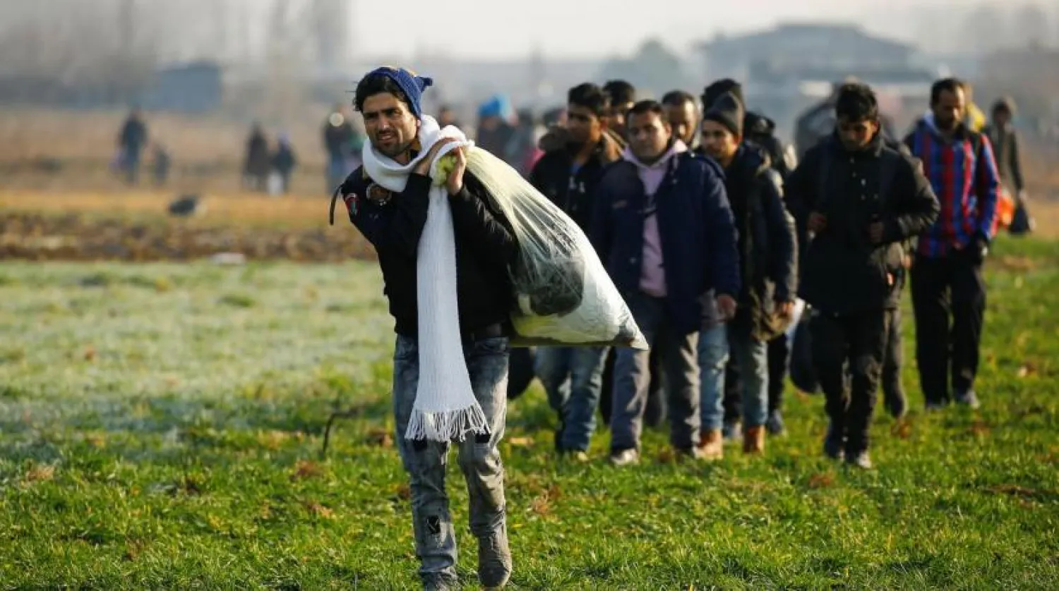 Migrants walk towards Turkey’s Pazarkule border crossing with Greece, March 1, 2020. (Reuters)

