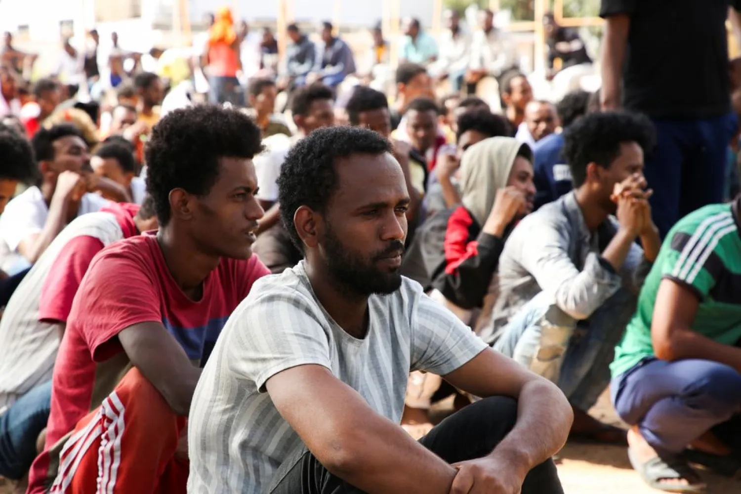 Migrants gather at a detention center at Ain Zara, in Tripoli, Libya October 12, 2021. REUTERS/Hazem Ahmed