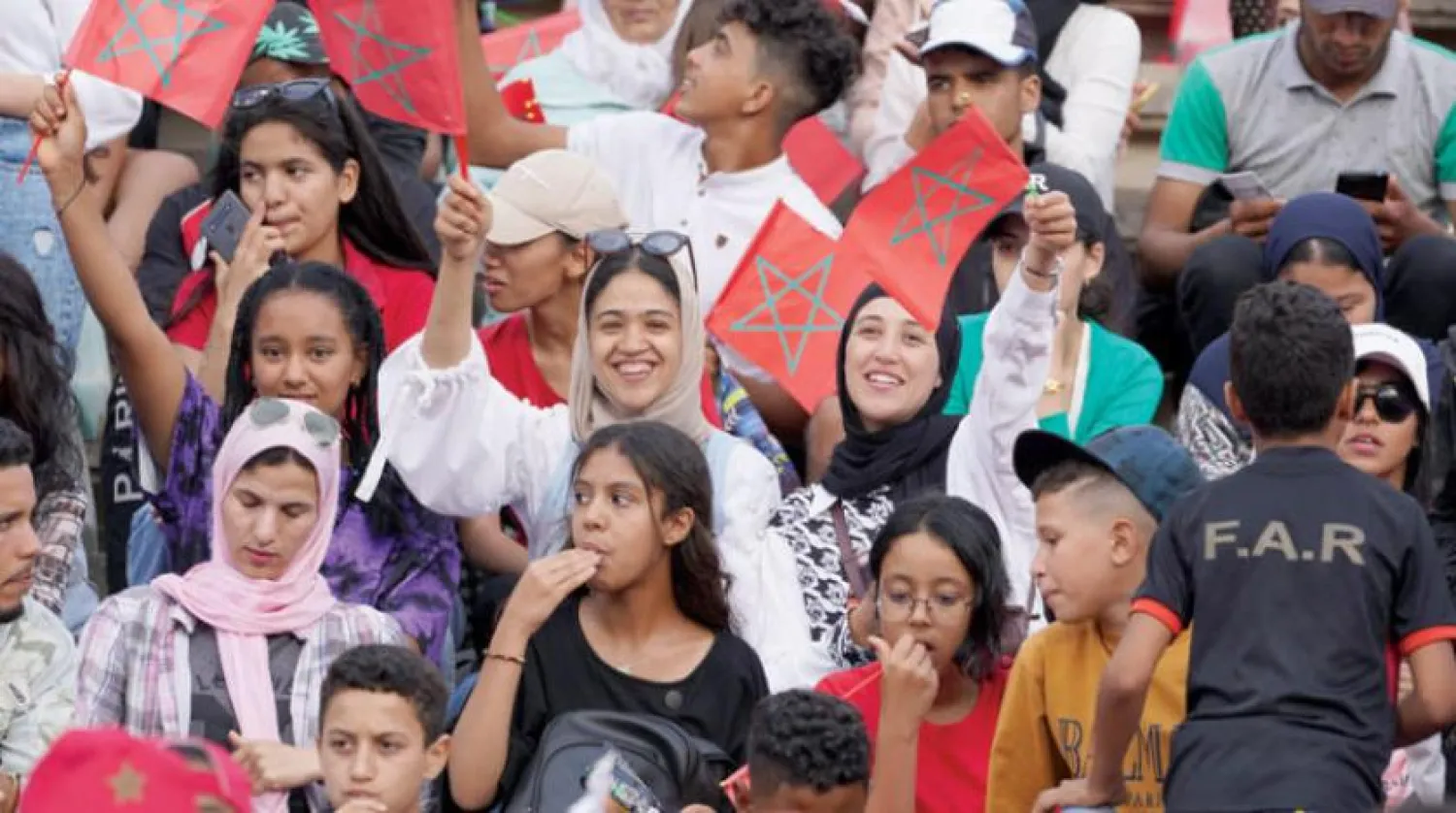 Moroccan youths are seen at a sports event (EPA) 